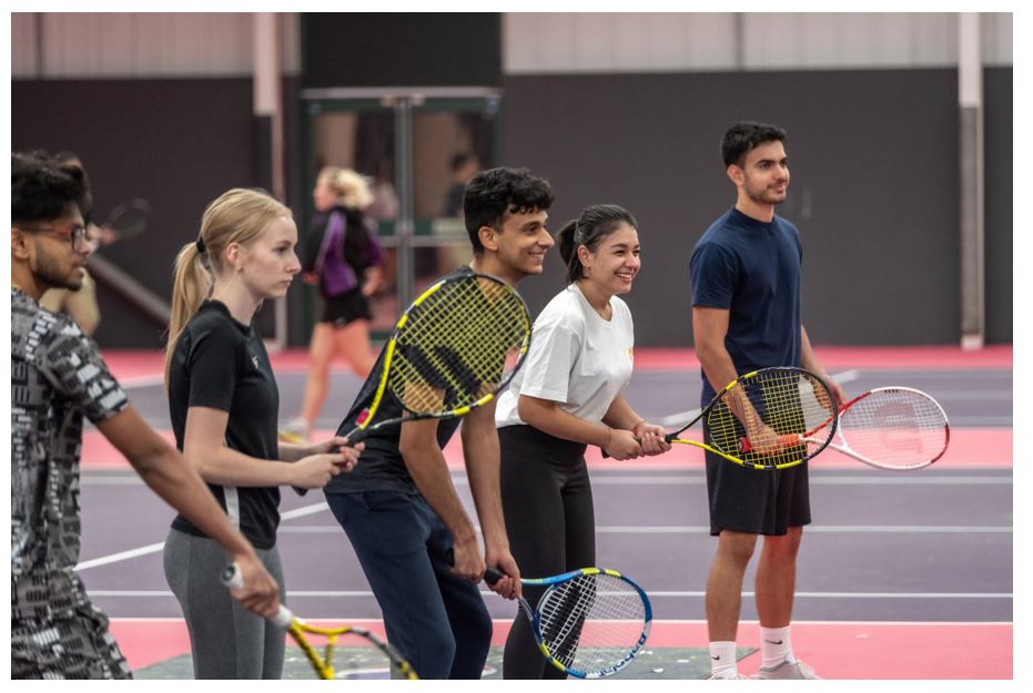 Sport for all at Loughborough University. A group of people playing sport.